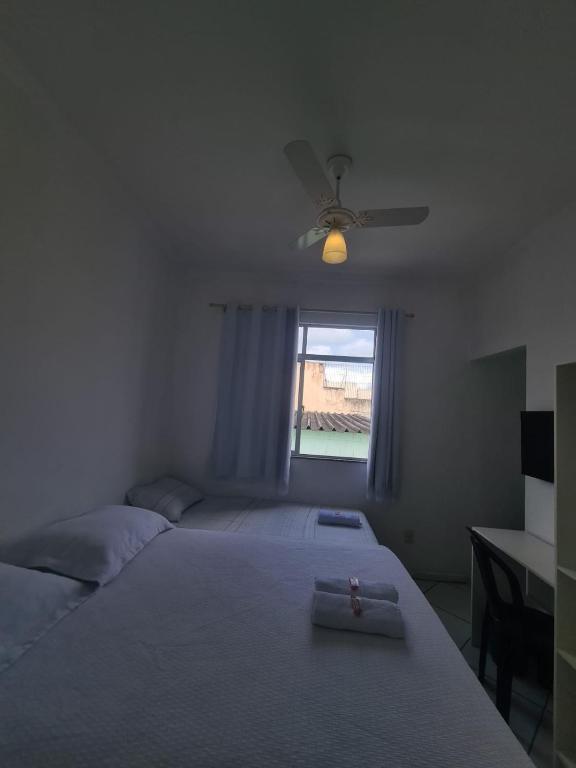 Postel nebo postele na pokoji v ubytování Hotel Aconchegante