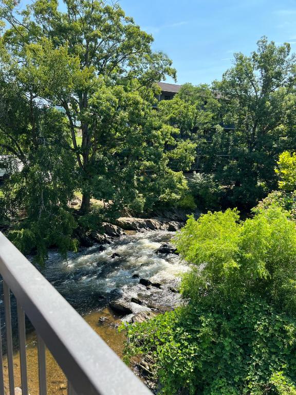 a view of a river from a balcony at Creekstone Inn in Pigeon Forge