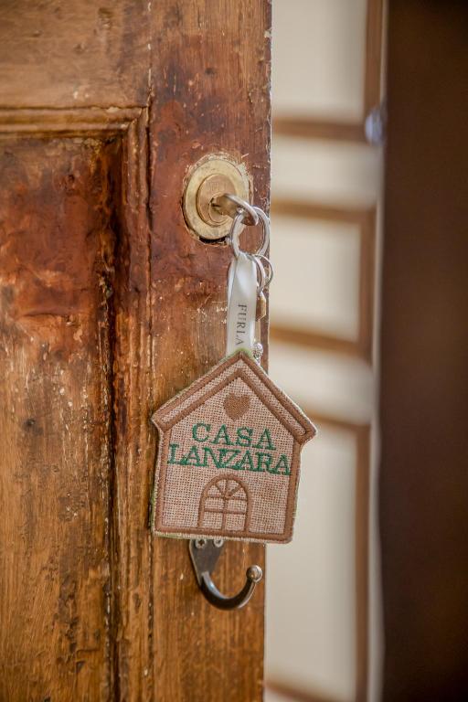 Certifikát, hodnocení, plakát nebo jiný dokument vystavený v ubytování Casa Lanzara