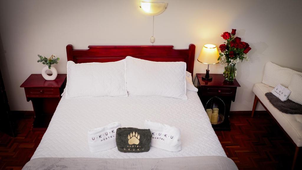 Postel nebo postele na pokoji v ubytování UKUKU Hostel