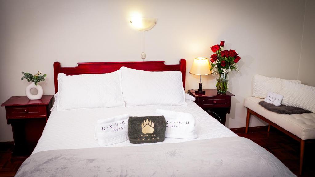 Postel nebo postele na pokoji v ubytování UKUKU Hostel