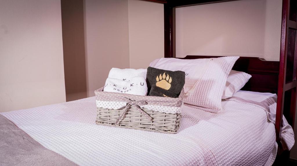 Postel nebo postele na pokoji v ubytování UKUKU Hostel