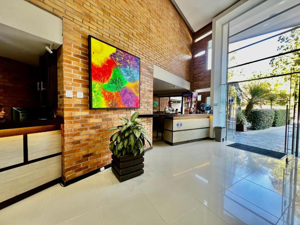 TV a/nebo společenská místnost v ubytování Hotel Toscana Oriente
