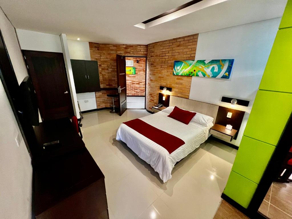 Postel nebo postele na pokoji v ubytování Hotel Toscana Oriente