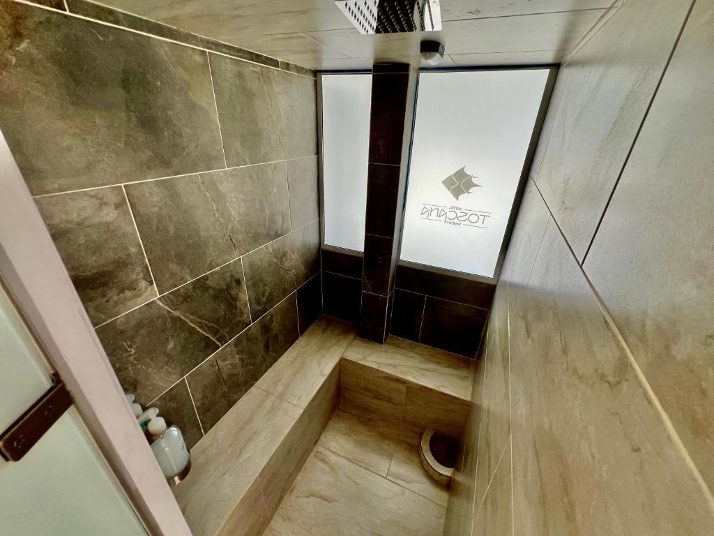 Koupelna v ubytování Hotel Toscana Oriente