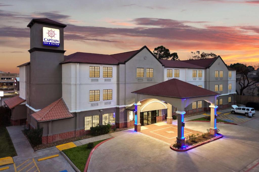 una representación de un hotel con una torre de reloj en Melrose @ Seabrook, BW Signature Collection by Best Western, en Seabrook