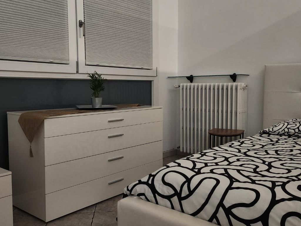 Postel nebo postele na pokoji v ubytování Al civico 10