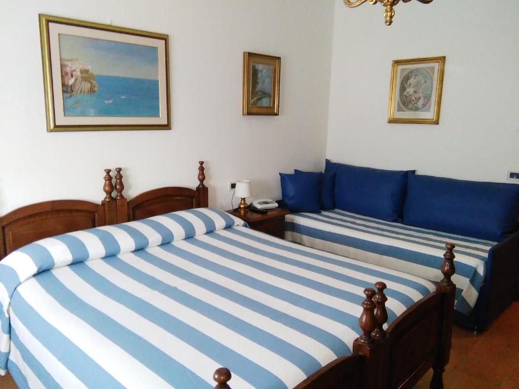 Postel nebo postele na pokoji v ubytování Ristorante Hotel Mira