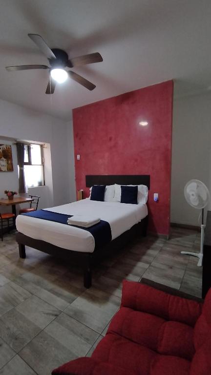 Postel nebo postele na pokoji v ubytování Hotel Gandag