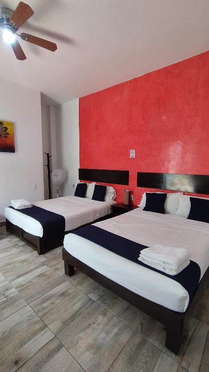 Postel nebo postele na pokoji v ubytování Hotel Gandag