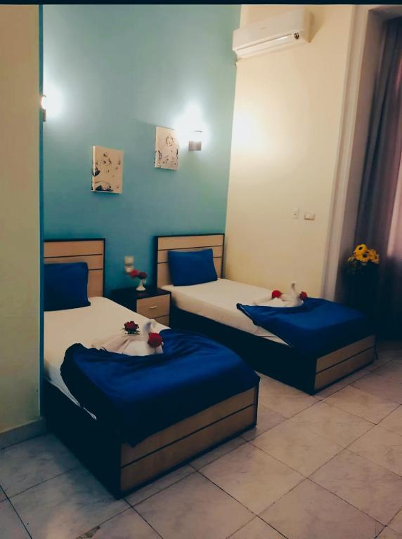 Postel nebo postele na pokoji v ubytování Hostgram Hotel