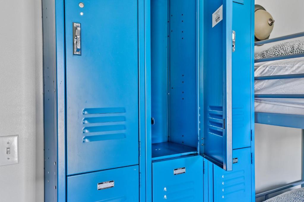 a blue locker is next to a bunk bed at Samesun Banff Hostel in Banff
