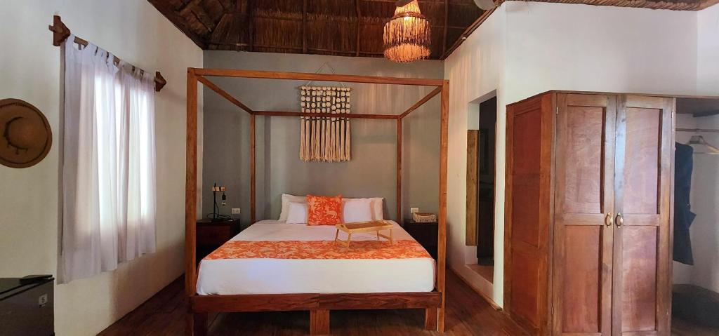 Postel nebo postele na pokoji v ubytování Hotel Kin Tulum Jungle Deluxe
