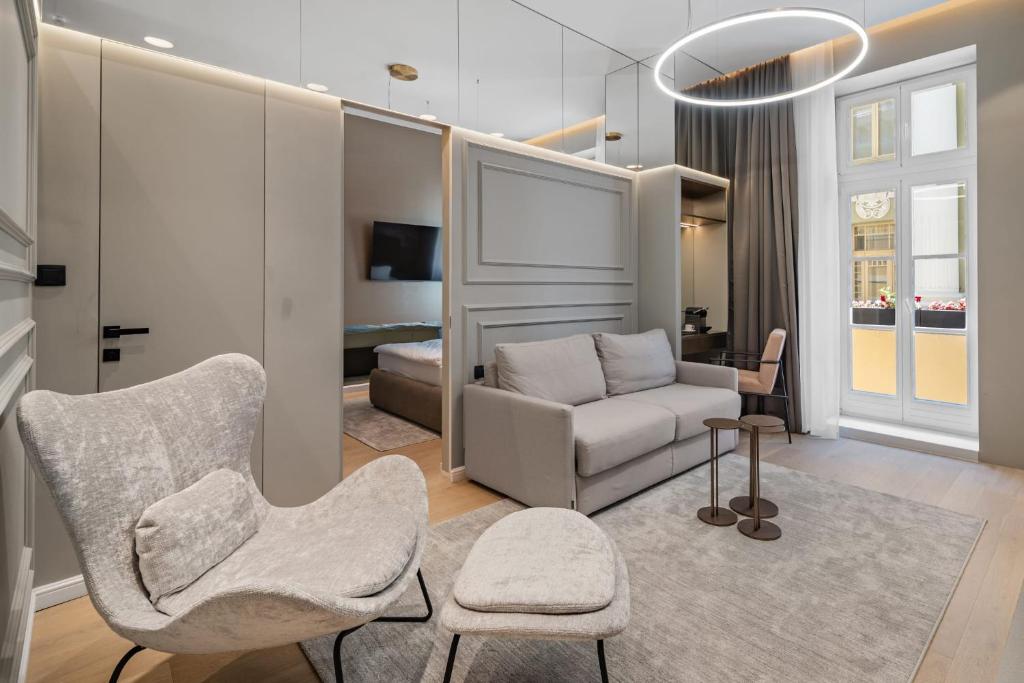 Posezení v ubytování Monamel Luxury Suites