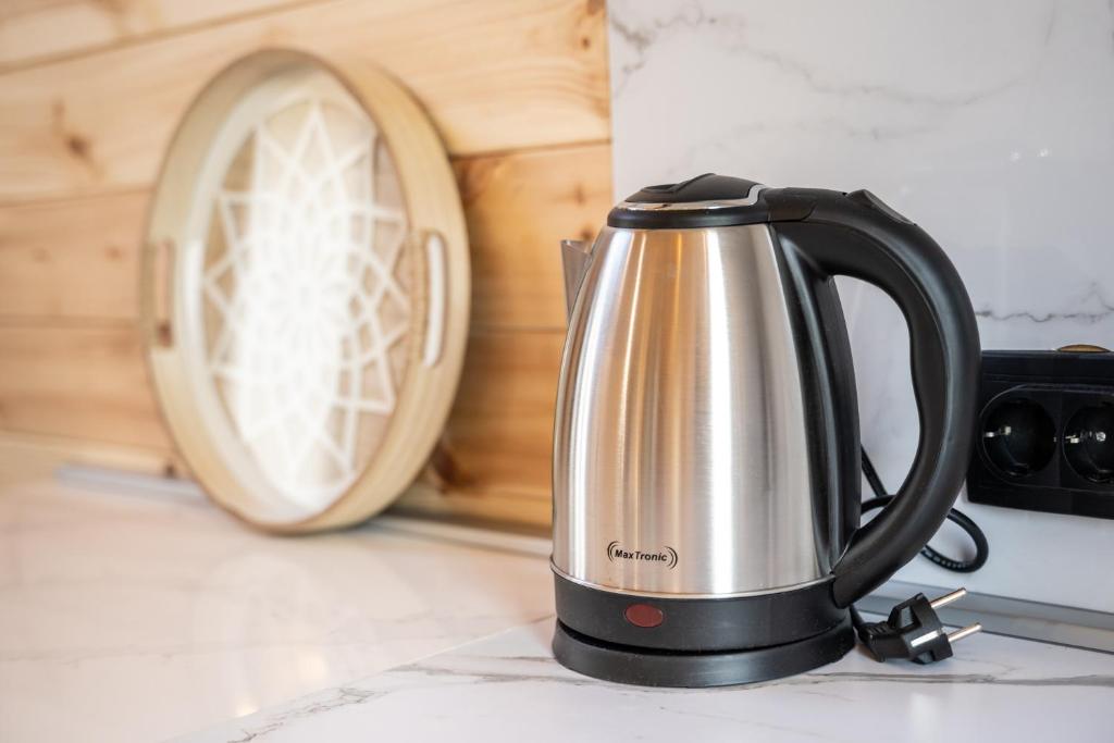 Příslušenství pro přípravu čaje a kávy v ubytování RAOS Cottage