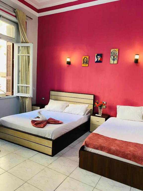 Postel nebo postele na pokoji v ubytování Hostgram Hotel