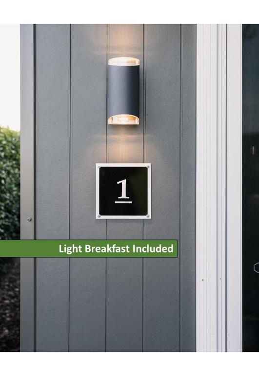 a light on a door with a light breakfast included at Church Lane Accommodation, Milawa. in Milawa
