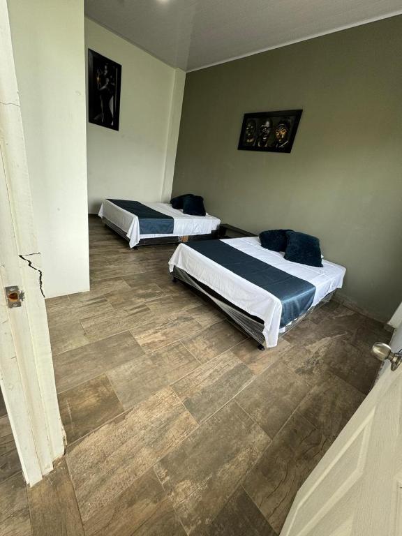Ένα ή περισσότερα κρεβάτια σε δωμάτιο στο Quinta La Bonita Restrepo-Meta
