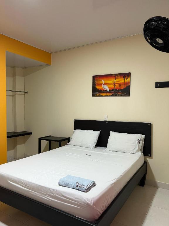 Postel nebo postele na pokoji v ubytování Vanko Hotel