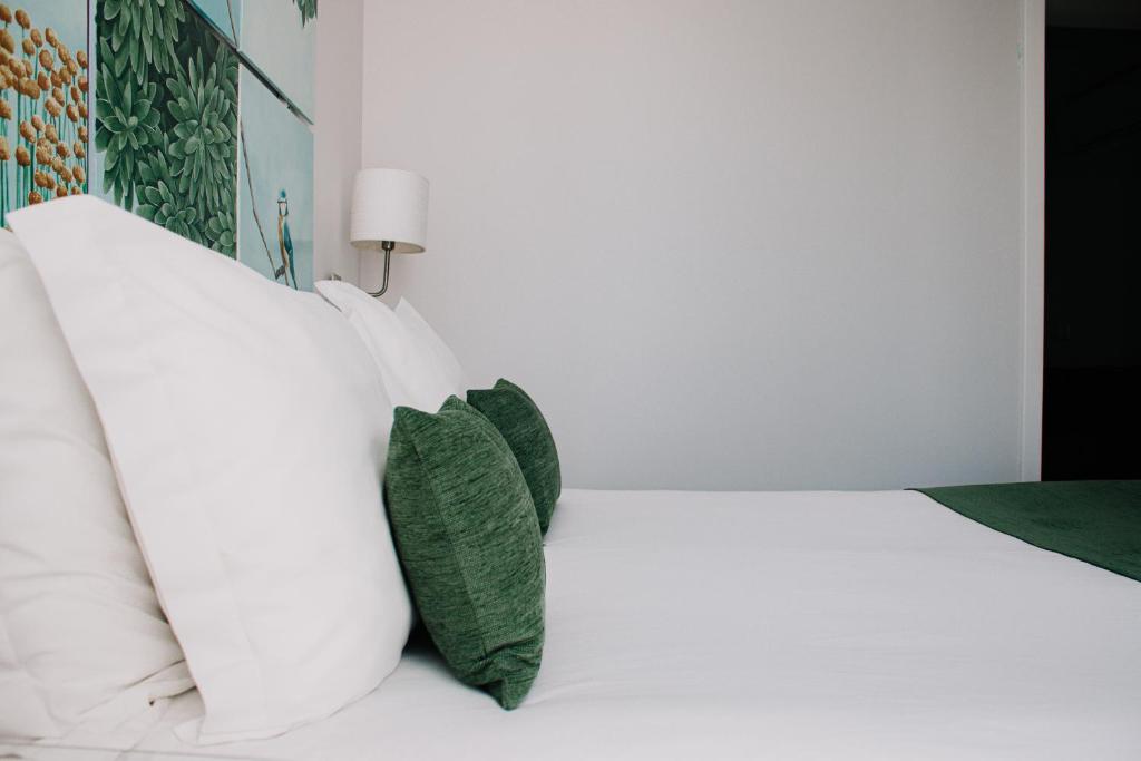 Кровать или кровати в номере Rio Art Hotel