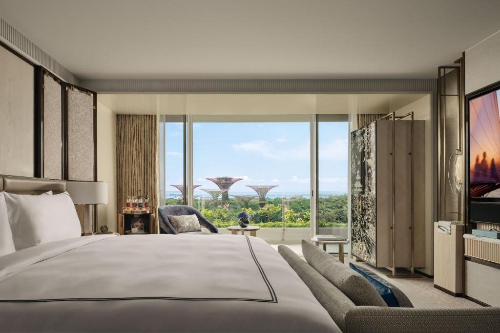 Ein Bett oder Betten in einem Zimmer der Unterkunft Marina Bay Sands