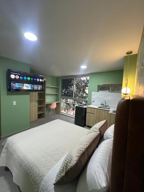 Postel nebo postele na pokoji v ubytování Amaranto Suites