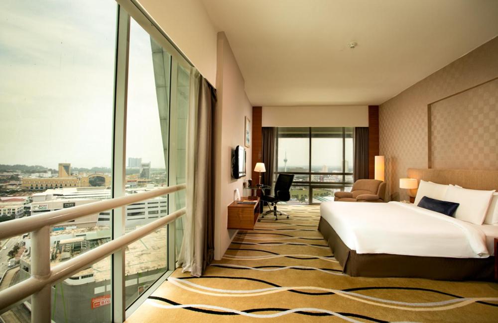 Postel nebo postele na pokoji v ubytování Zenith Hotel Kuantan