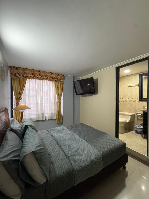 Postel nebo postele na pokoji v ubytování Hostelfc Marly