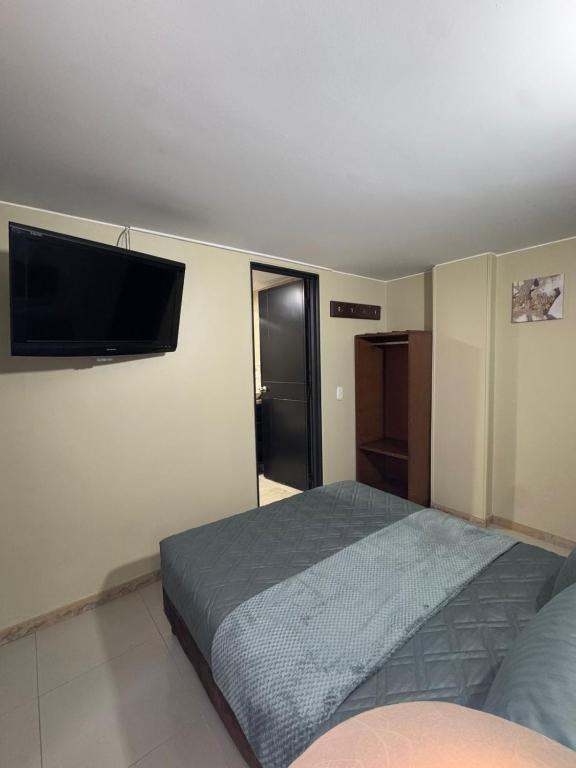Postel nebo postele na pokoji v ubytování Hostelfc Marly