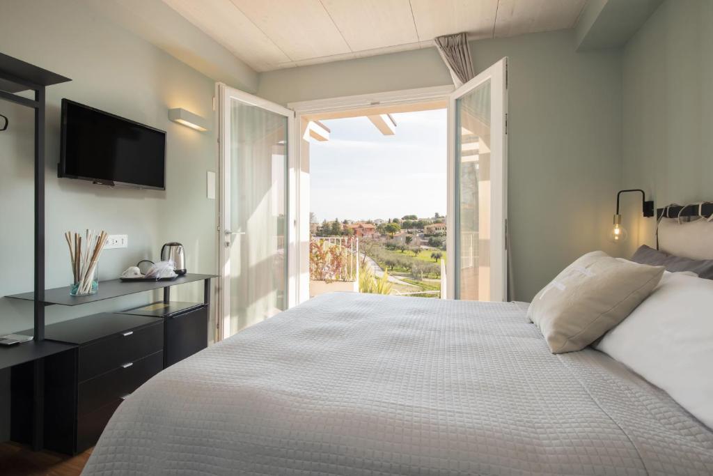 Posteľ alebo postele v izbe v ubytovaní bed&breakfast Filomare