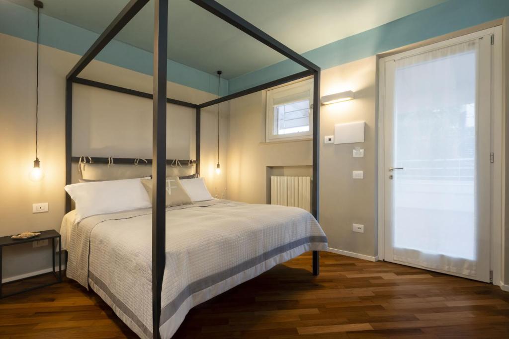Posteľ alebo postele v izbe v ubytovaní bed&breakfast Filomare