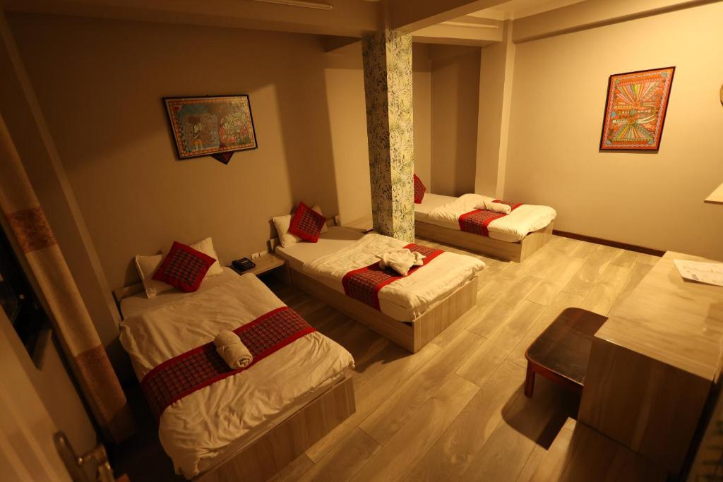 Postel nebo postele na pokoji v ubytování Bed and Pillow Hostel