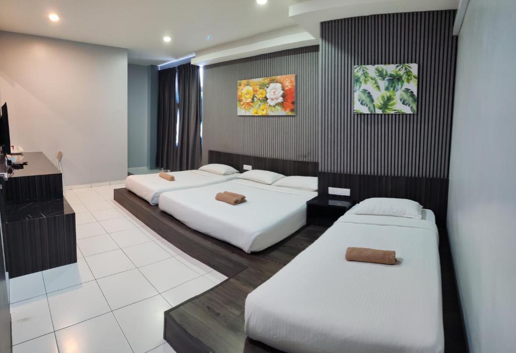 Postel nebo postele na pokoji v ubytování Hotel Eco Desaru