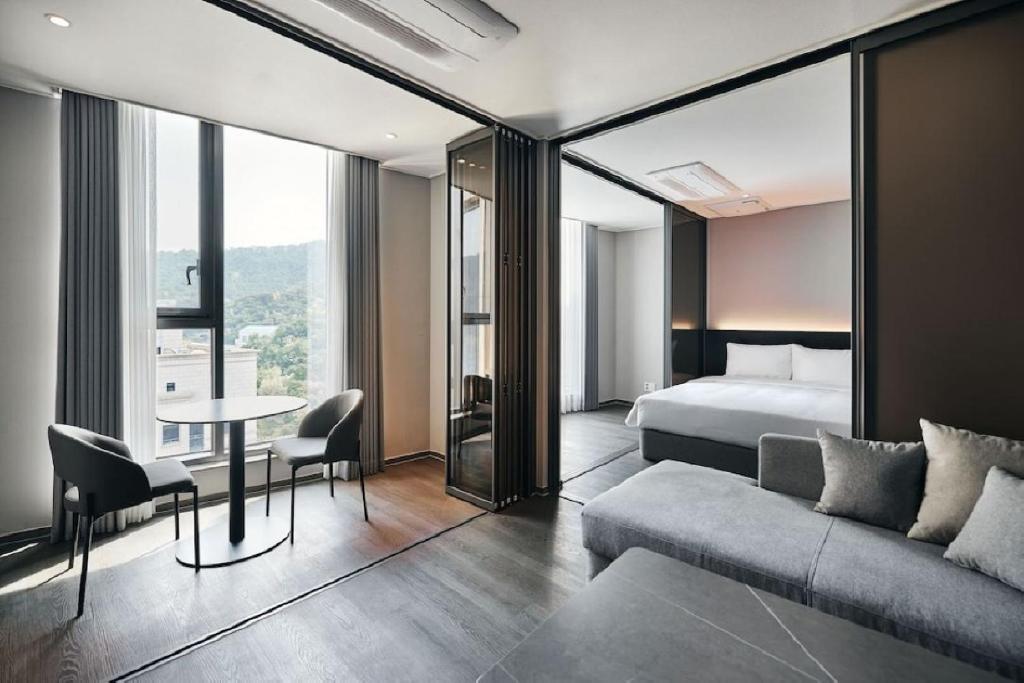 Posezení v ubytování Homes Stay Myeongdong