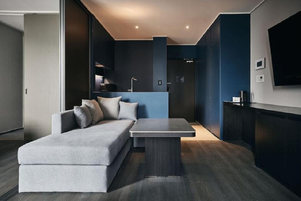 Posezení v ubytování Homes Stay Myeongdong