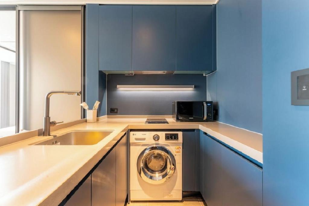 Kuchyň nebo kuchyňský kout v ubytování Homes Stay Myeongdong