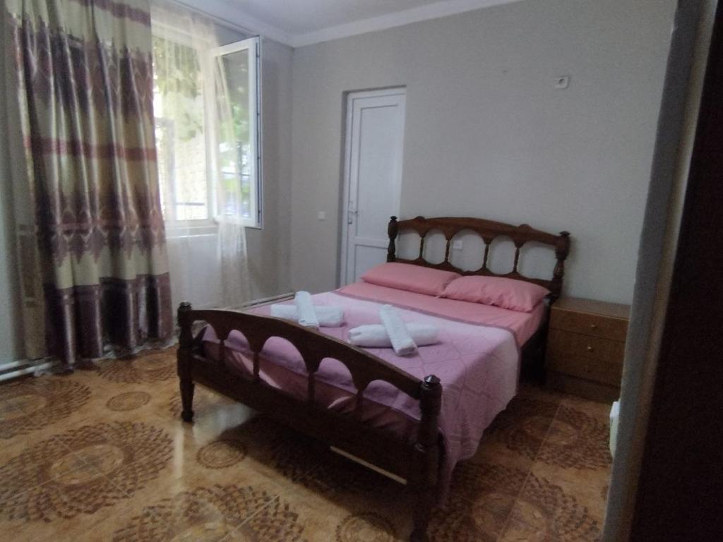 Postel nebo postele na pokoji v ubytování Guest house on Devyatnadtsataya