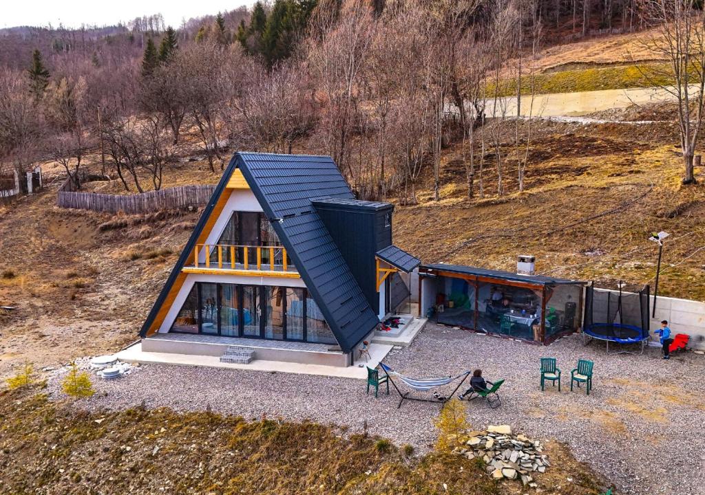 an overhead view of a tiny house on a hill at Sunrise View Chalet in Trăisteni