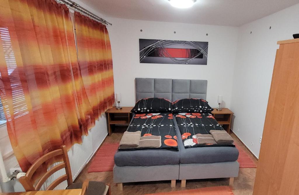Postel nebo postele na pokoji v ubytování Alenka