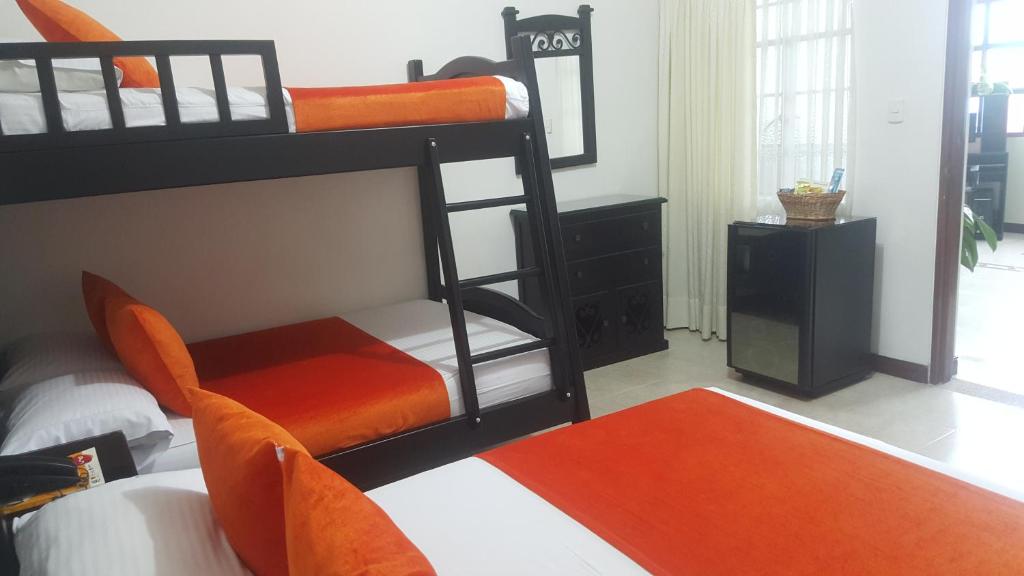 Postel nebo postele na pokoji v ubytování Hotel Colonial