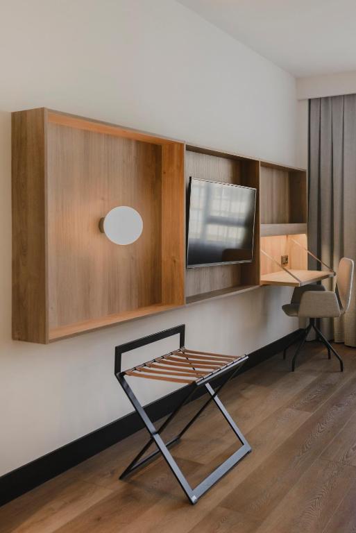 TV a/nebo společenská místnost v ubytování Hotel Dimar