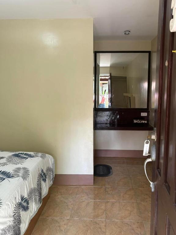 Postel nebo postele na pokoji v ubytování Dubay Panglao Beachfront Resort