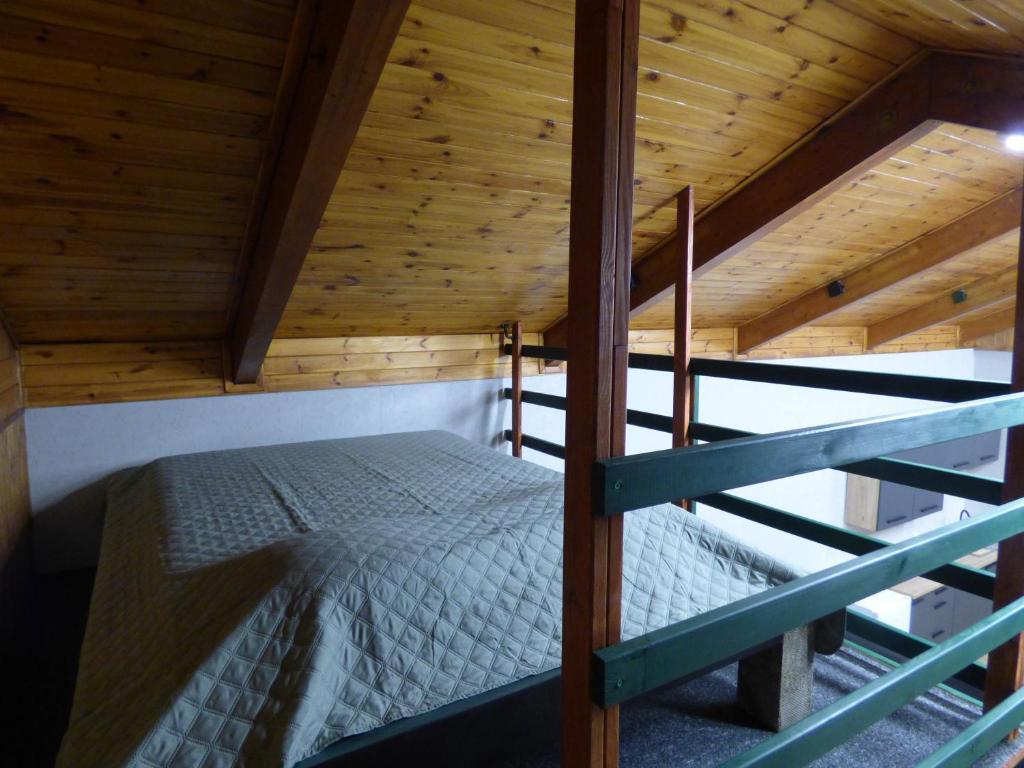 Postel nebo postele na pokoji v ubytování Apartmány za Plotem