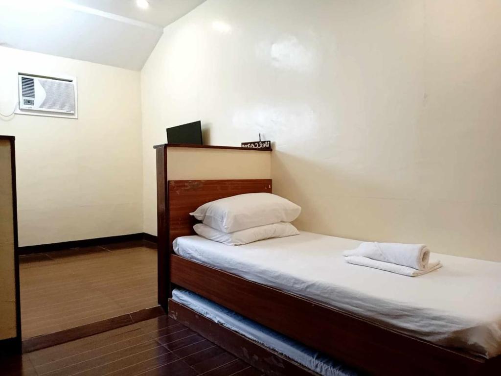 Postel nebo postele na pokoji v ubytování Dubay Panglao Beachfront Resort