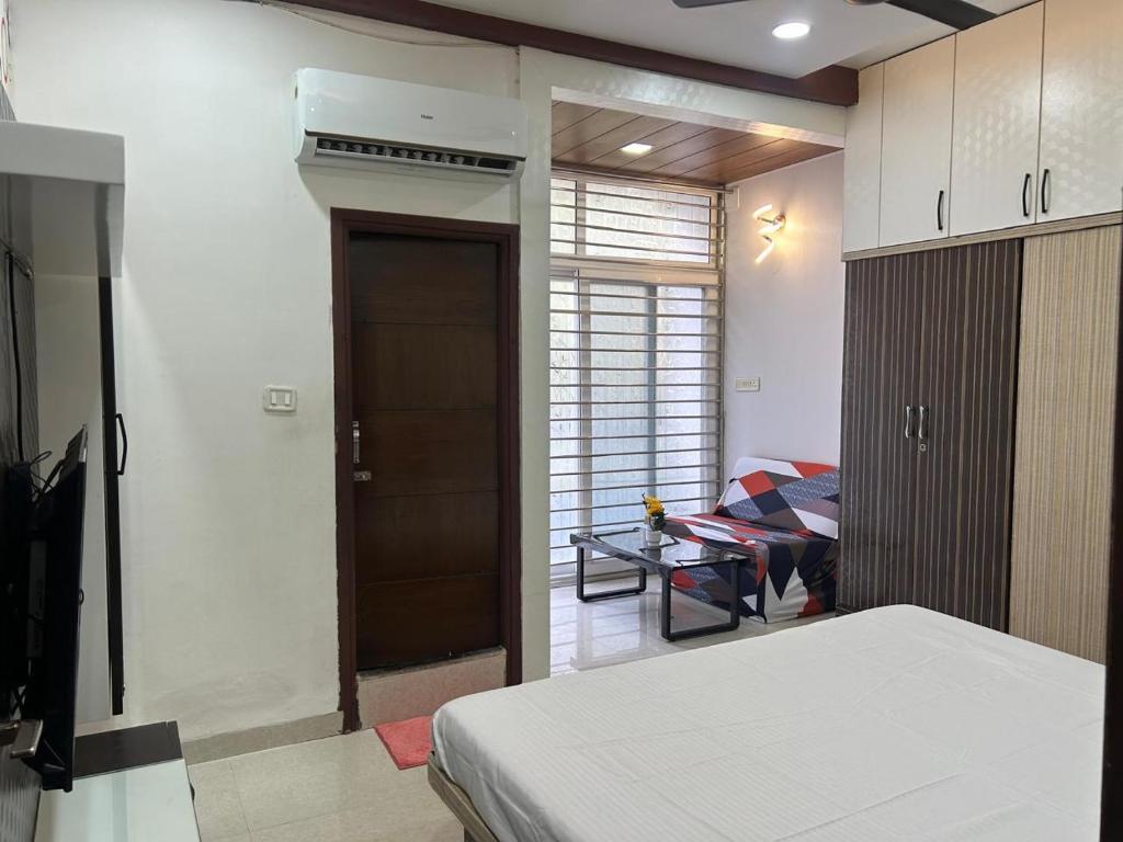 Katil atau katil-katil dalam bilik di Indore Home Stay