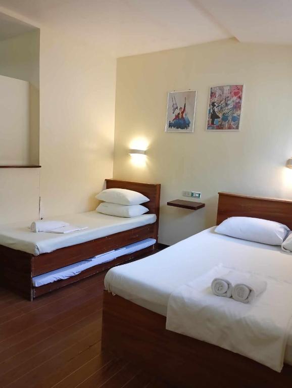 Postel nebo postele na pokoji v ubytování Dubay Panglao Beachfront Resort