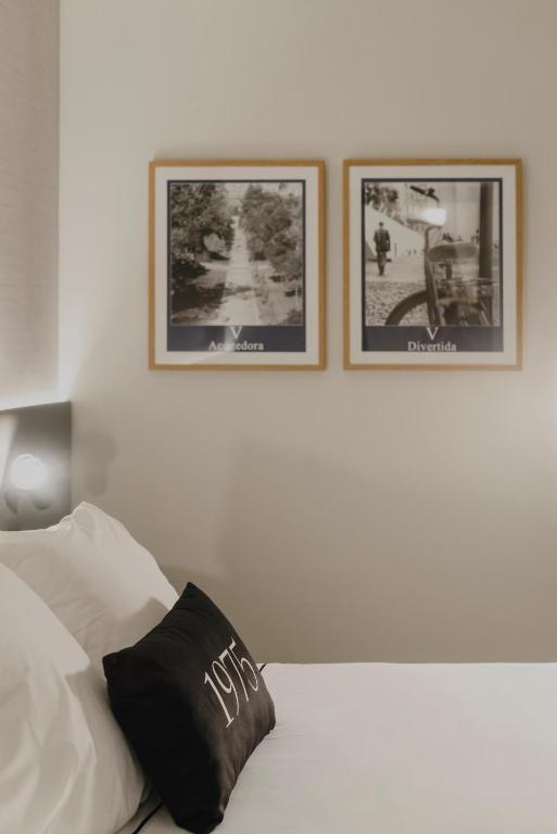 Postel nebo postele na pokoji v ubytování Hotel Dimar