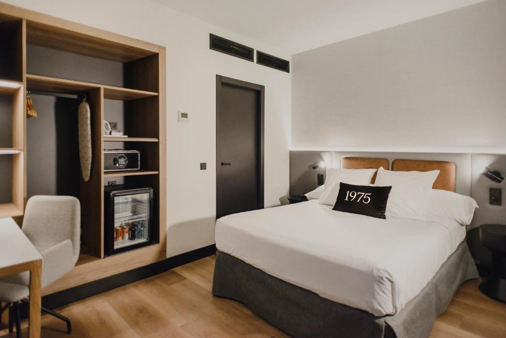 Postel nebo postele na pokoji v ubytování Hotel Dimar
