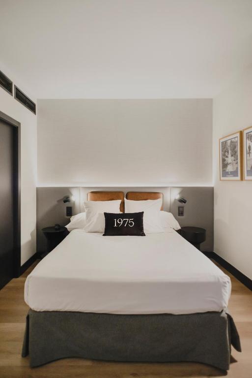 Postel nebo postele na pokoji v ubytování Hotel Dimar
