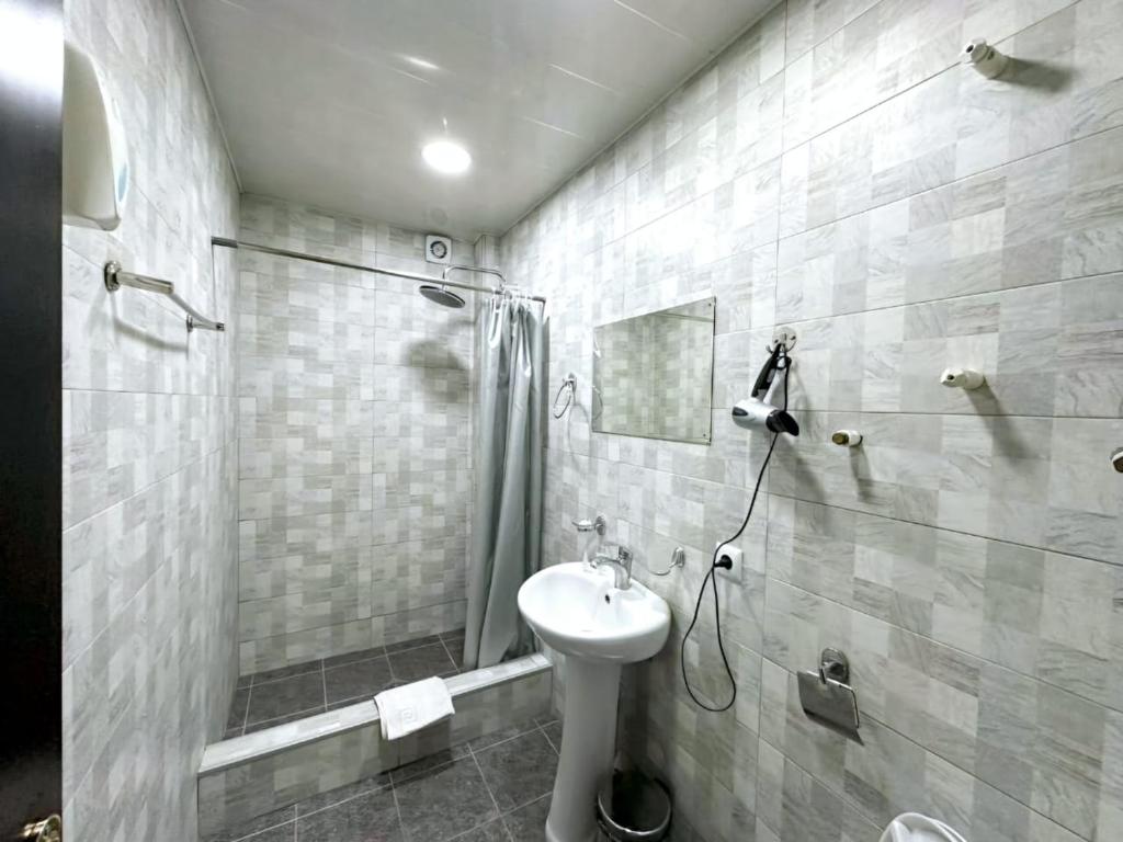 Koupelna v ubytování Hotel Home